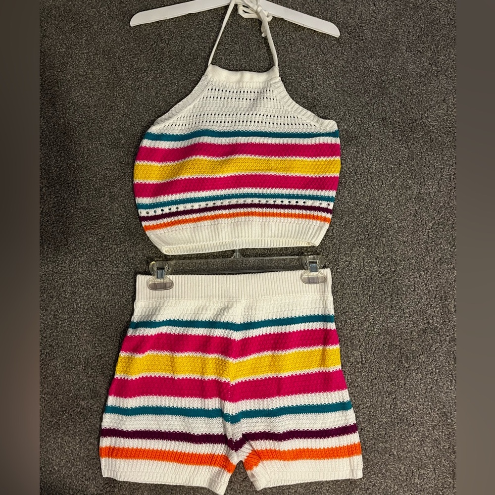 Women’s medium size halter crop top with matching striped cotton shorts.